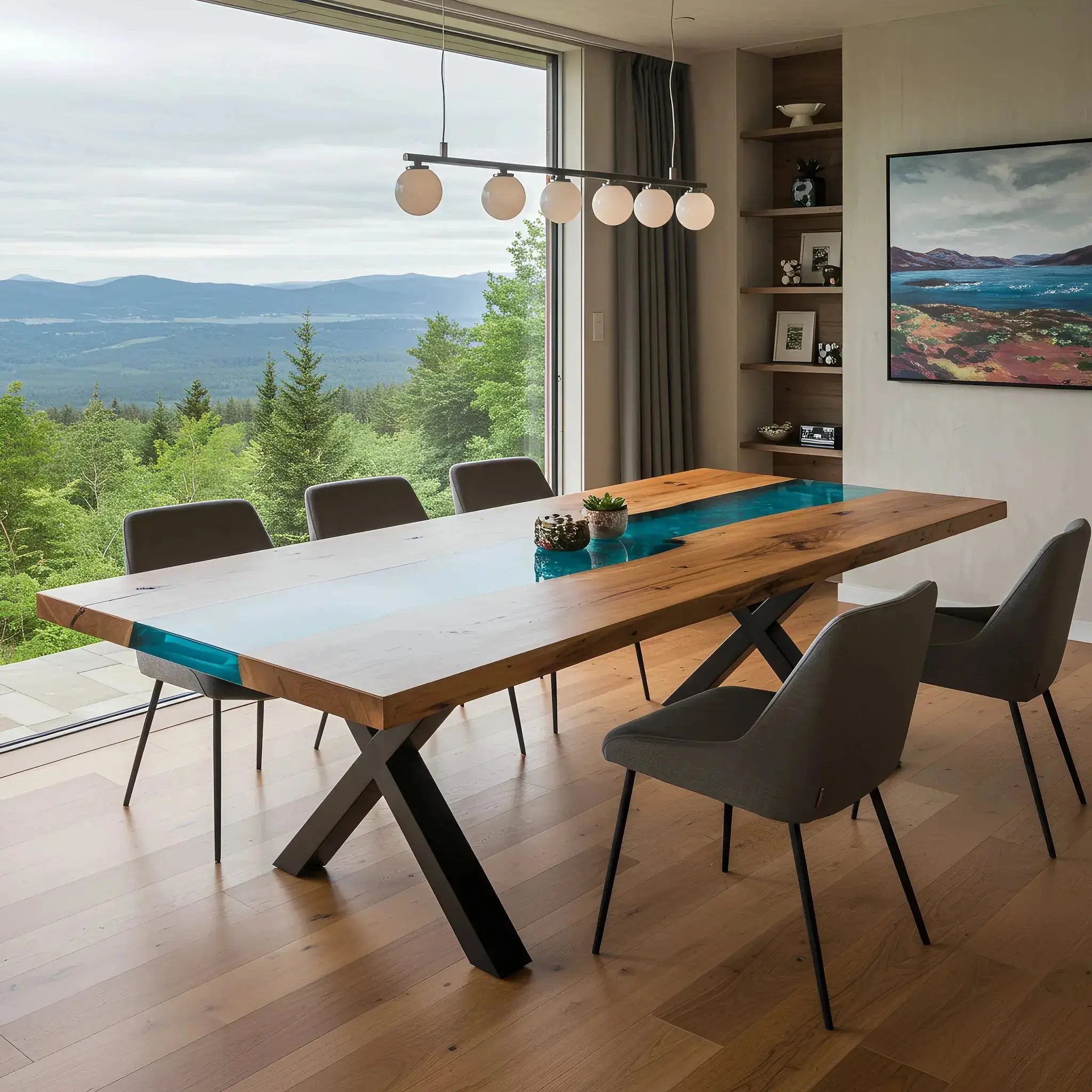 Handmade walnut and blue resin epoxy dining table in modern room with panoramic forest view. Blue Odyssey Dining Table with sleek black legs.
