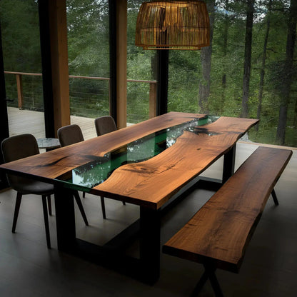 Walnut and green epoxy river dining table with matching bench, handmade in the USA, placed in a forest-view dining area with natural lighting.