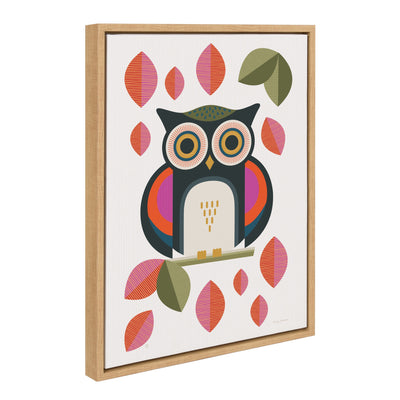 Framed colorful owl canvas artwork by Carey Copeland on a wall