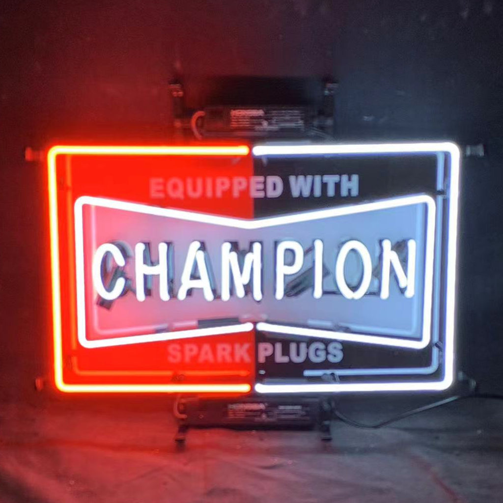Neon sign saying 'Equipped with Champion Spark Plugs' illuminated on acrylic or metal backing