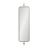 Tall rectangular mirror with rounded corners, framed by a slim metal border and adorned with spherical finials at top and bottom ends.