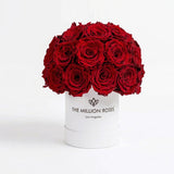 Essence White Superdome Box filled with 38-40 vibrant red roses arranged in a rounded crown