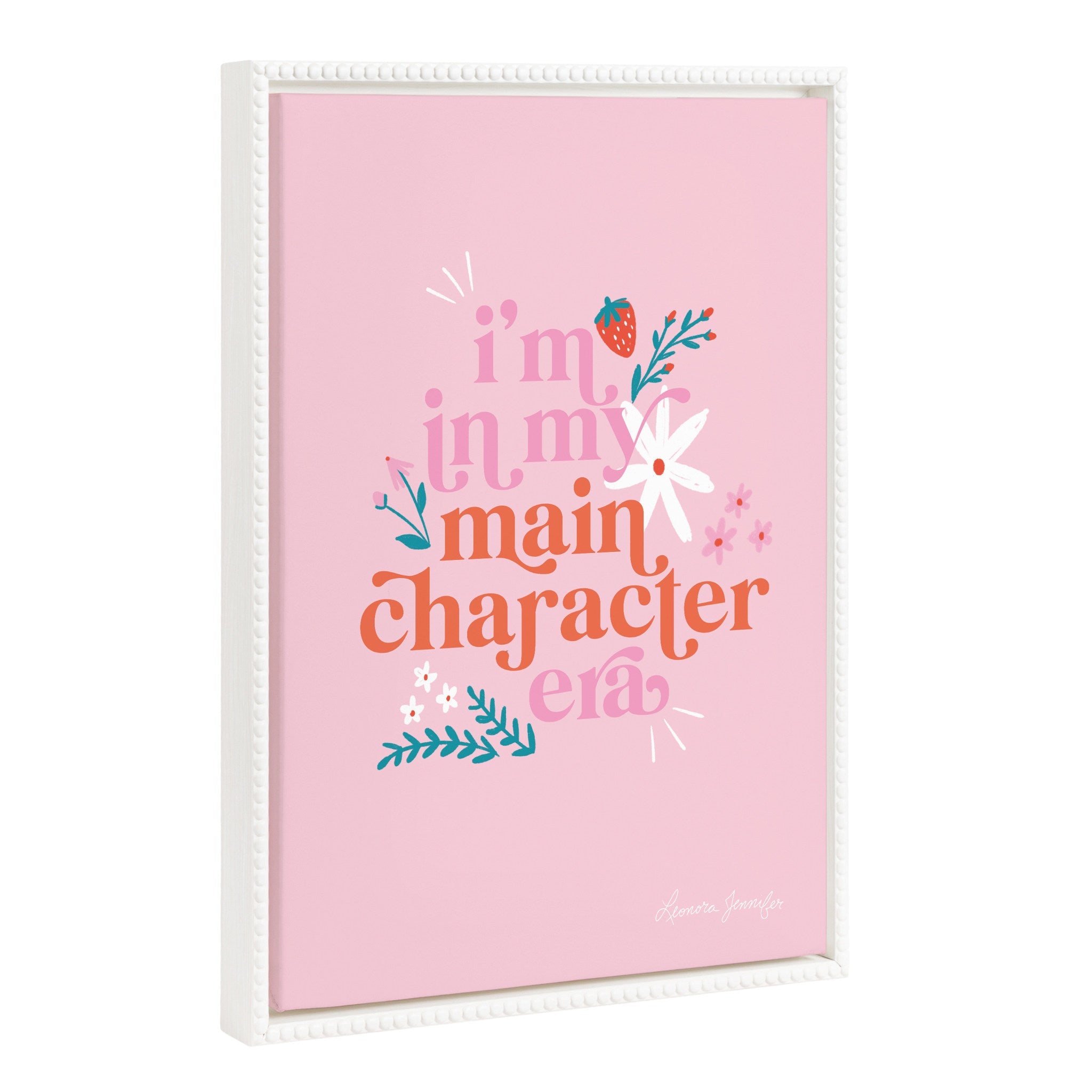 Framed canvas art titled 'Sylvie Beaded Main Character Era' showing a pink quote with vintage beaded frame