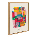 Abstract painting with overlapping blocks of yellow, red, blue, green, and pink, framed in a light wood frame, signed in black at the bottom center.