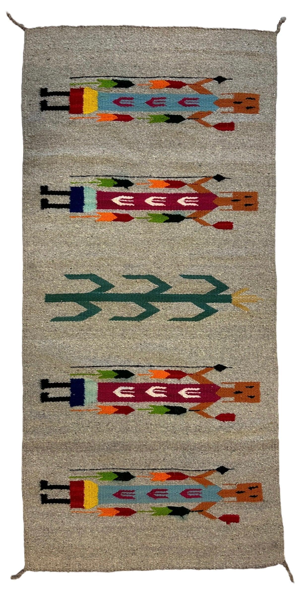 Exquisite Southwest Rug 2’5” x 5’2” displayed vertically, showing intricate Navajo-inspired geometric patterns in earth tones.