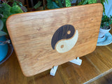 Cherry wood charcuterie board with Yin Yang inlay made from Peruvian walnut and maple