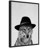 Sylvie Minimalist Wolf framed canvas art showing a minimalist blue-tone wolf illustration in a floating white frame.