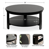 Round black wood coffee table with a 34-inch diameter tabletop and lower shelf for storage, featuring a satin black wood finish and 17-inch height