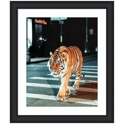 Framed art piece of a tiger crossing an urban crosswalk at night under streetlights