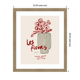 Minimalist drawing of red flowers in a vertically striped green vase with handwritten red text 'Les Fleurs' and small black text below on beige background, framed in light wood.