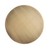 Round metal tabletop with a smooth, brushed gold finish and subtle radial texture, shown from a top-down view on a white background.
