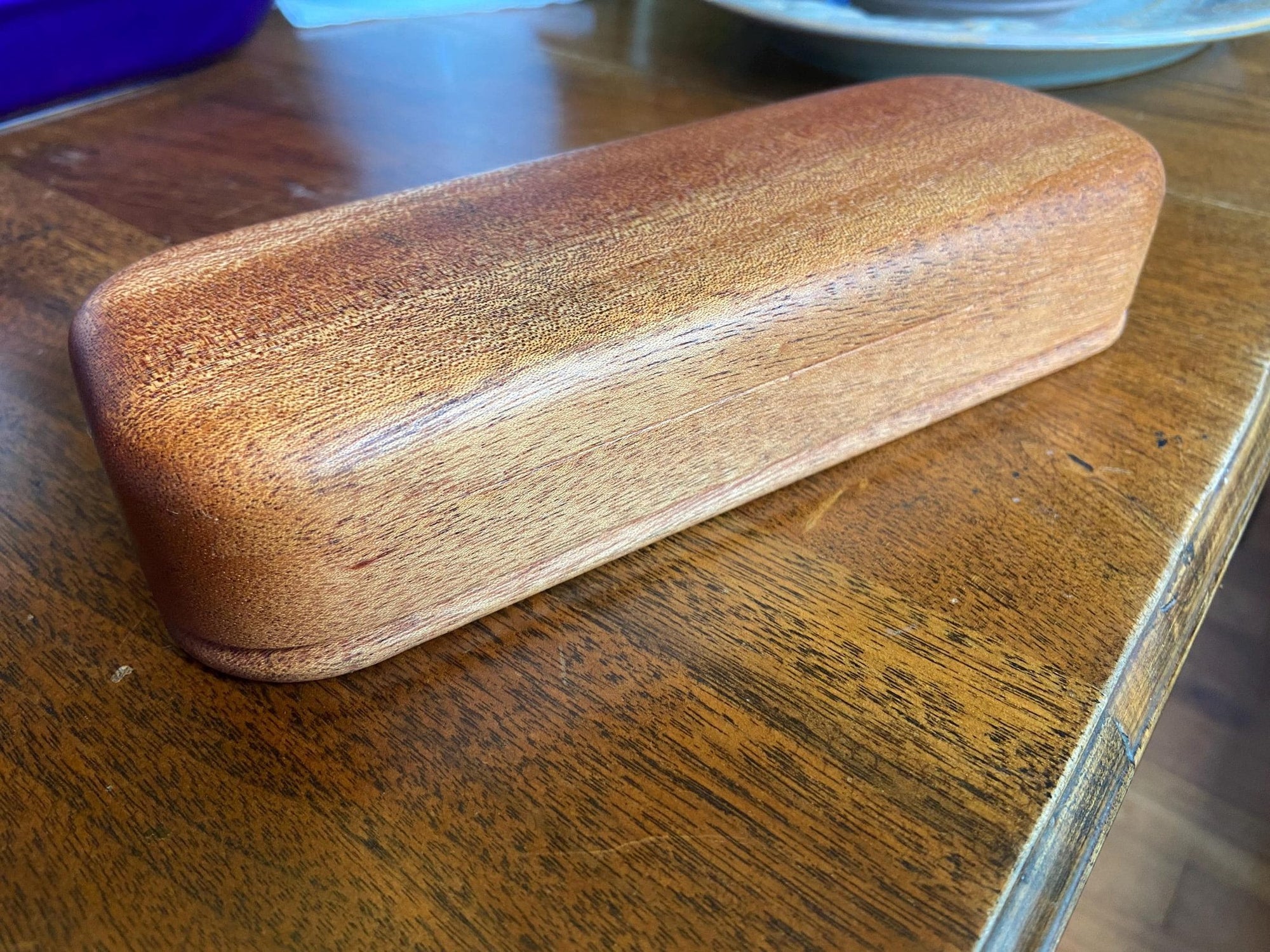 Handcrafted mahogany keepsake box with sliding dovetail joinery and beaded bottom detail