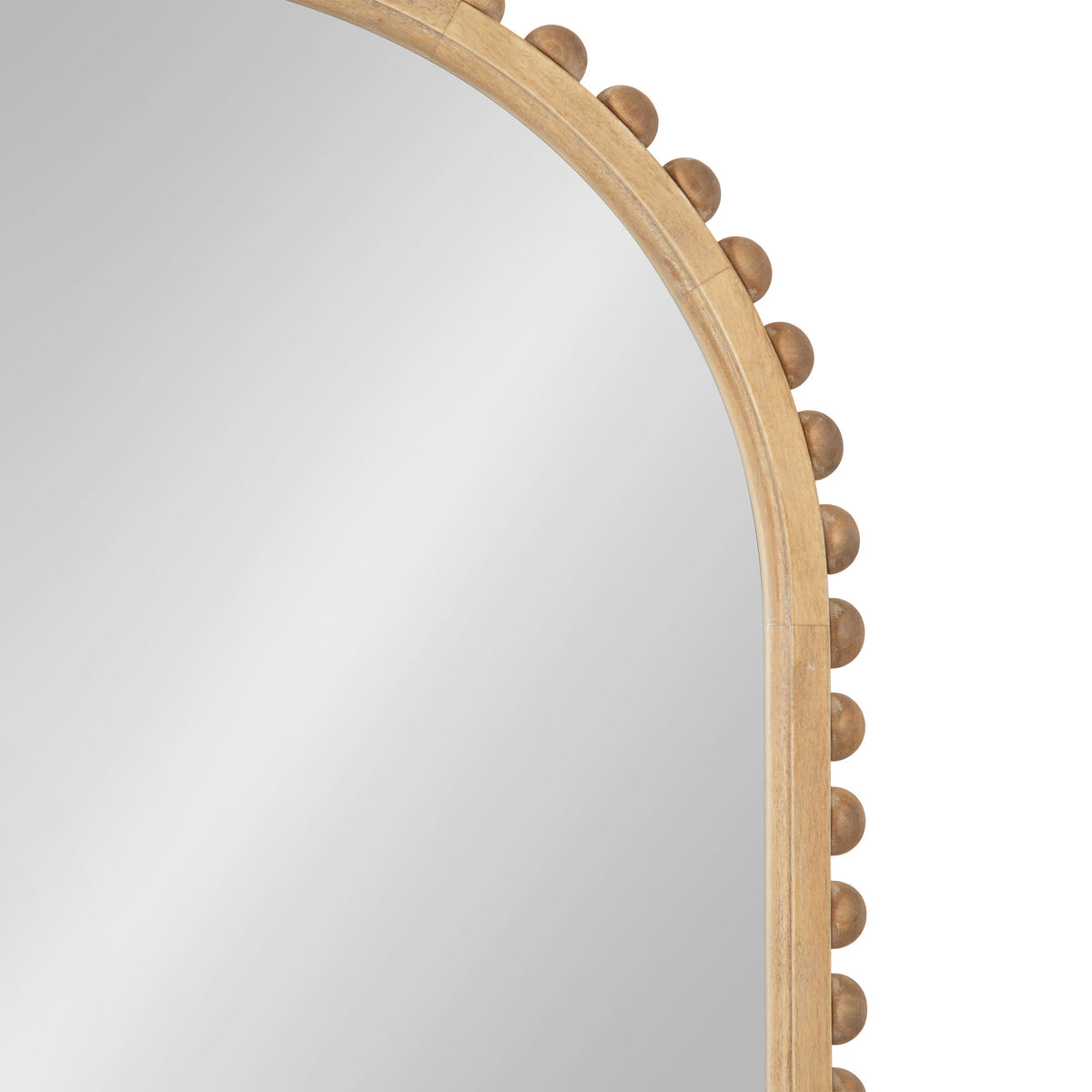 Arched wall mirror with light wood frame accented by evenly spaced rounded wooden knobs along the outer curve, shown against a white background.