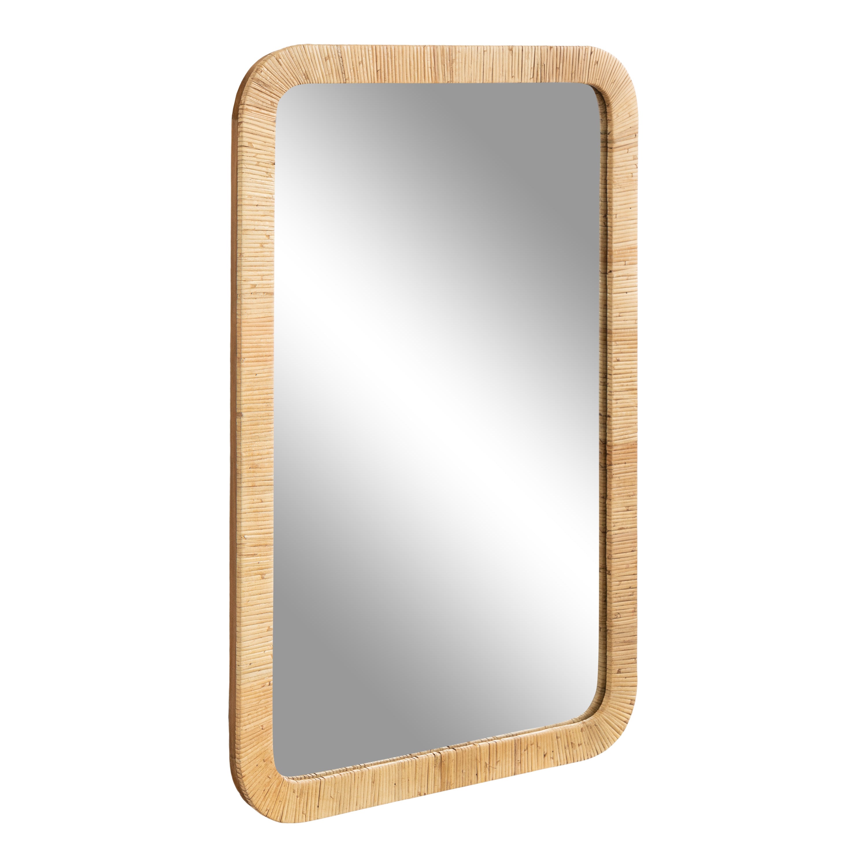 Rahfy Rectangle Framed Wall Mirror with natural rattan frame hung on a white wall next to a modern brown leather chair