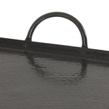 Close-up of a black hammered metal tray corner showing a curved handle and textured surface with subtle reflections