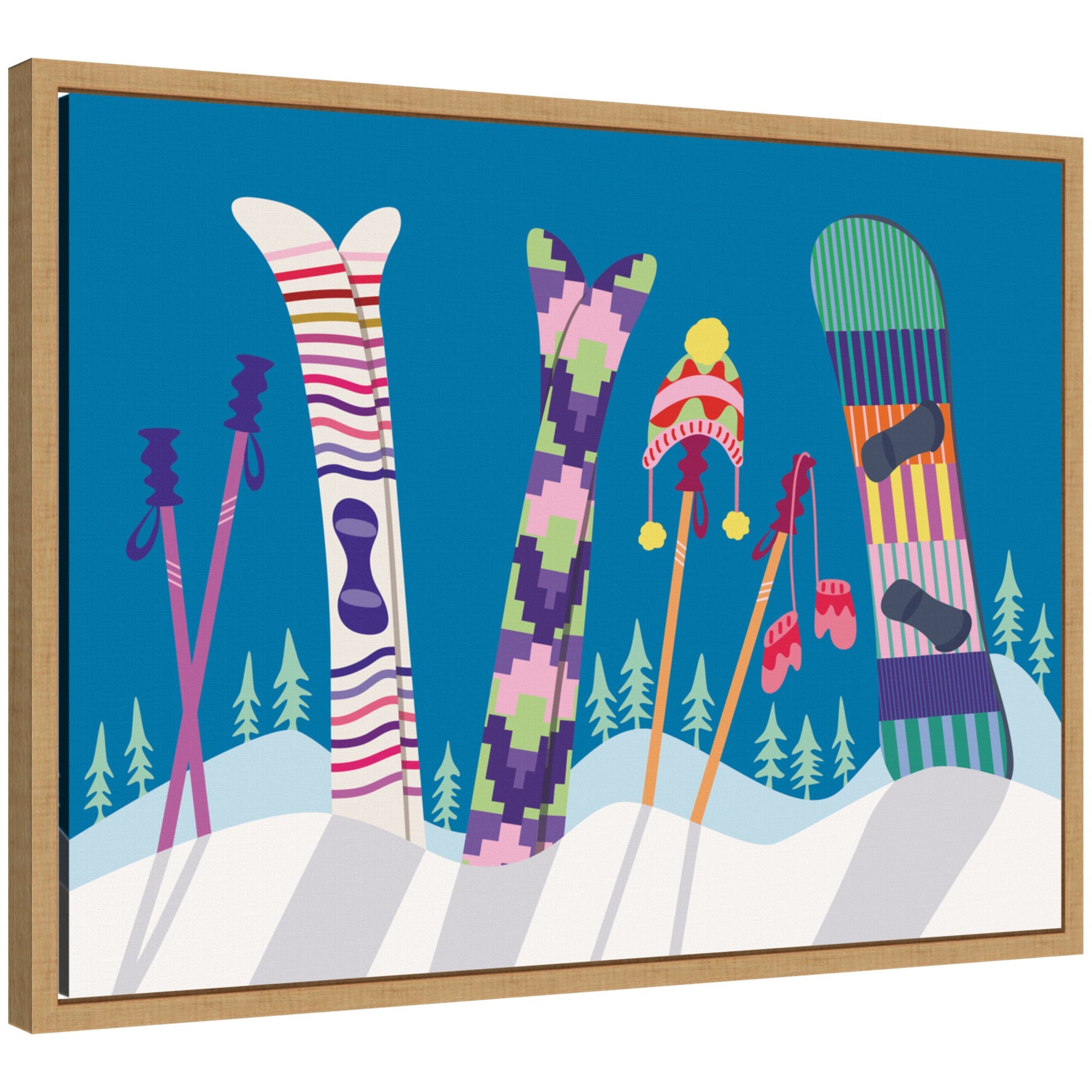 Framed canvas art titled 'Winter Ski Village' showing colorful skis and a snowboard standing in fresh snow with stylized evergreens and blue sky
