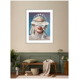 Framed art print of a woman with long white hair wearing a lace top, a large white moth covering her eyes, and a moon phase crown, set against a starry night background.