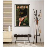 Framed art print of a black cat wearing round green glasses, a green jacket, and a pink bow tie with butterfly illustrations and absinthe-themed text on dark background.