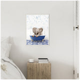 Canvas artwork featuring a realistic baby elephant sitting in a small blue clawfoot bathtub against a white floral wallpaper and blue patterned floor background