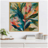 Abstract botanical painting with bold tropical leaves in teal, coral, green, and peach tones on neutral linen background framed in light wood.