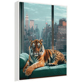 A tiger with orange and black stripes lounges on a teal couch in front of large windows showing a city skyline with tall buildings under a blue sky.