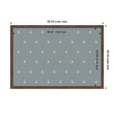 Rectangular pinboard with dark wooden frame, blue fabric surface decorated with evenly spaced light beige botanical leaf motifs, dimensions labeled as 38 by 26 inches outer size.