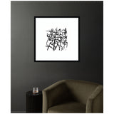 Square black-framed wall art featuring abstract black lines and shapes on a white background, mounted on a dark gray wall above an olive green armchair.