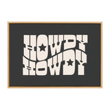 Black canvas with bold beige text reading 'HOWDY HOWDY' featuring star accents inside the letters, framed in a light wood frame.