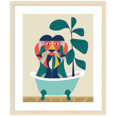 Framed Mid Century Modern art print of an abstract lion in a colorful geometric design sitting in a vintage bathtub with a green plant nearby.