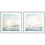 Two framed watercolor prints depicting soft pastel skies and serene landscapes with gentle clouds and subtle horizon lines in light blues, pinks, and greens.