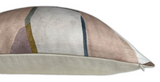 Side view of a rectangular pillow cover with abstract vertical stripes in muted tones of pink, mustard, gray, and blue on a light beige background.