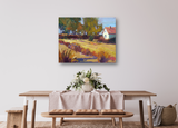 Impressionist-style canvas painting of a rural autumn scene with golden fields, green and orange trees, and a white house with a red roof under a blue sky.