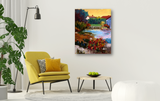 Colorful impressionistic painting of a French village pond with vibrant flowers and buildings under a yellow sky, hanging above a modern yellow chair and round table.