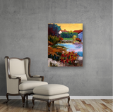 Colorful impressionist painting of a French village with lush greenery, a reflective pond, and red-roofed houses under a yellow sky, hanging on a gray wall