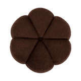 Round ottoman with deep brown fabric upholstery divided into six large tufted segments, viewed from above.