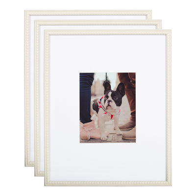 Three-piece Adlynn Beaded Photo Frame Set in light neutral wall setting