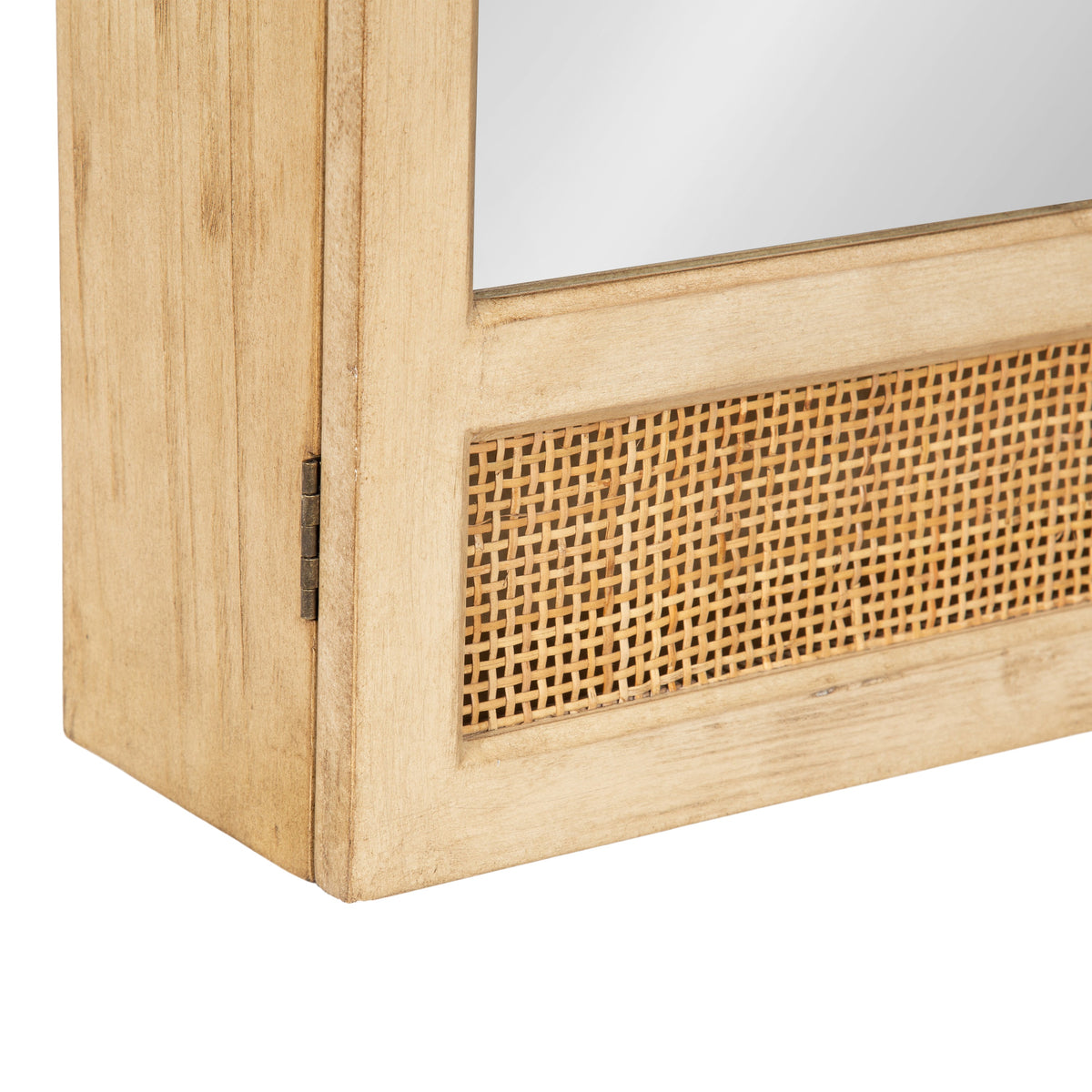 Corner detail of a light wood-framed mirror featuring a woven rattan panel below the glass, showcasing smooth grain and natural finish.