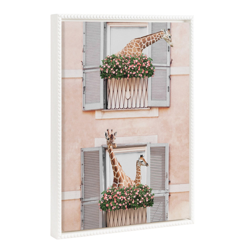 Framed canvas art showing neighboring giraffes with a vintage beaded white frame