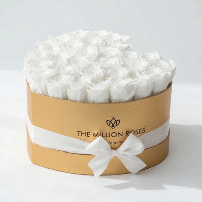 Heart shaped gold box filled with 28-30 hand-formed white roses