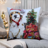 Square white throw pillow featuring a beagle wearing a red Santa hat beside a small decorated Christmas tree and colorful wrapped gifts with bows.