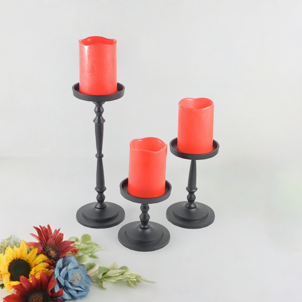 Glossy black metal pillar candle holders set of three in varying heights