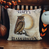 Square throw pillow with a vintage-style illustration of a brown owl in front of a full moon, with 'Happy Halloween' text in dark decorative font.