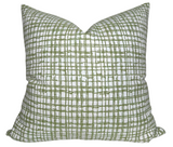 Arcadia Woven Pillow Cover in Sage displayed on green grass outdoors