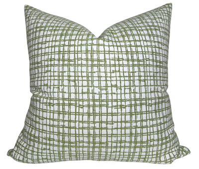 Arcadia Woven Pillow Cover in Sage displayed on green grass outdoors
