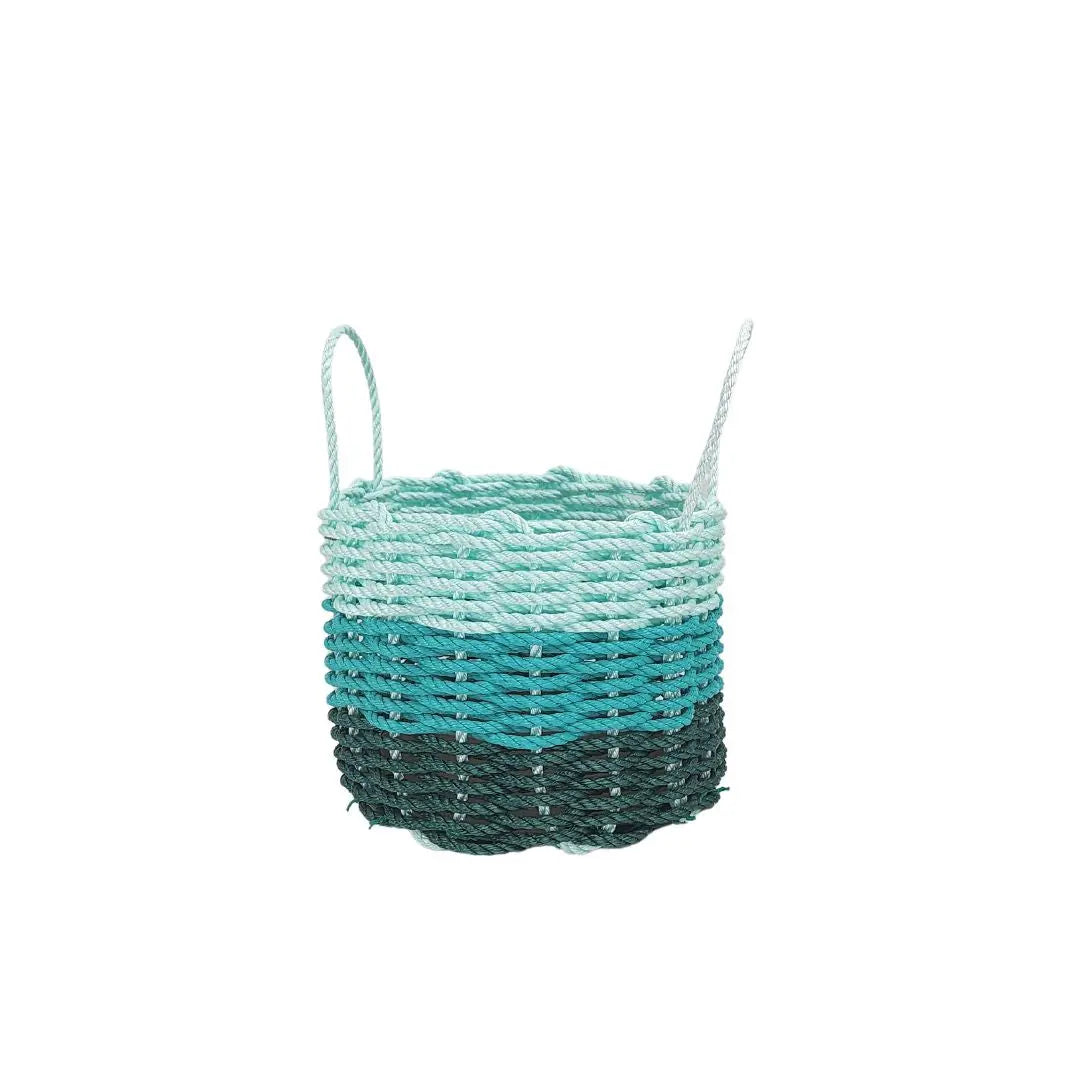 Handmade lobster rope storage baskets in hunter green, teal, and seafoam colors, shown in three sizes