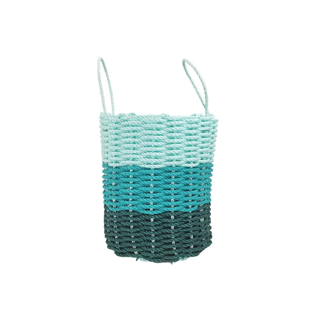 Handmade lobster rope storage baskets in hunter green, teal, and seafoam colors, shown in three sizes