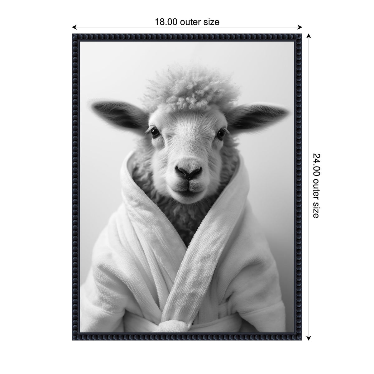 Black and white framed photo of a sheep facing forward, wrapped in a fluffy white bathrobe with a plain background.