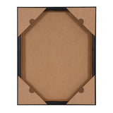 Back of a rectangular framed canvas showing four brown cardboard corner protectors securing the artwork within a thin black frame on a white background.
