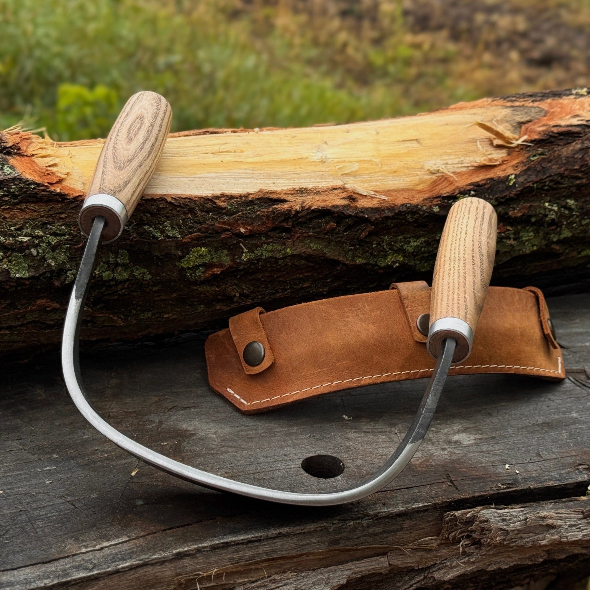 Half-rounded drawknife (inshave) with curved blade and leather sheath