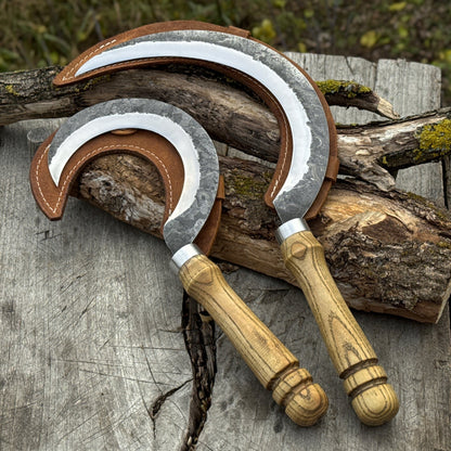 Hand-forged 2-piece sickle set with wooden handles and leather sheaths